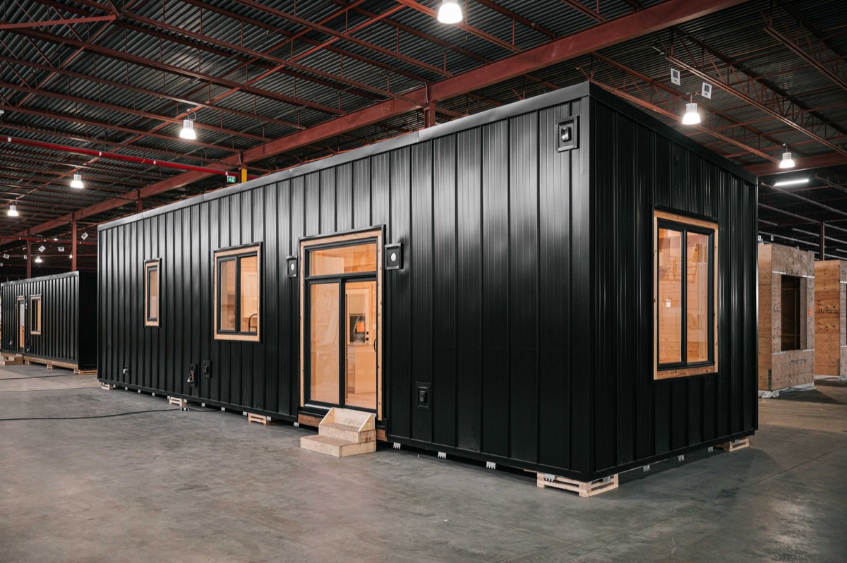 Finished module with black standing seam siding inside the Elk Ridge shop